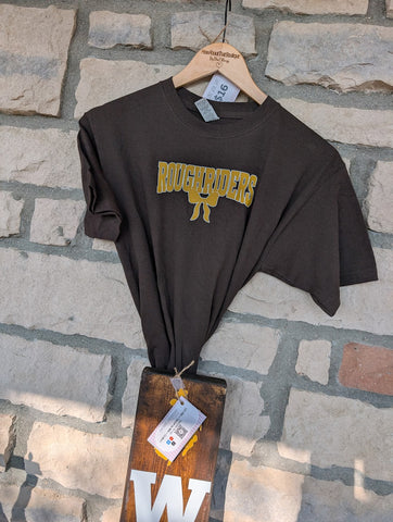 Size Youth large, Short Sleeve, Brown Gold Roughrider bow underneath smaller decal