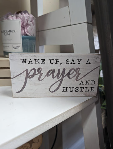 Shelf Sitter or Wood Block that says "Wake up say a prayer and hustle"